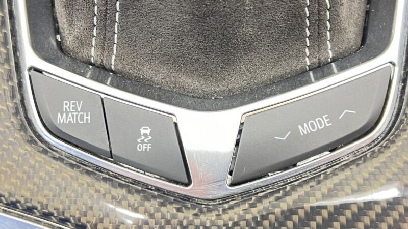 87828564 22-24 CADILLAC CT5 V BLACKWING MANUAL SHIFT BOOT SURROUND PANEL CARBON FIBER OEM