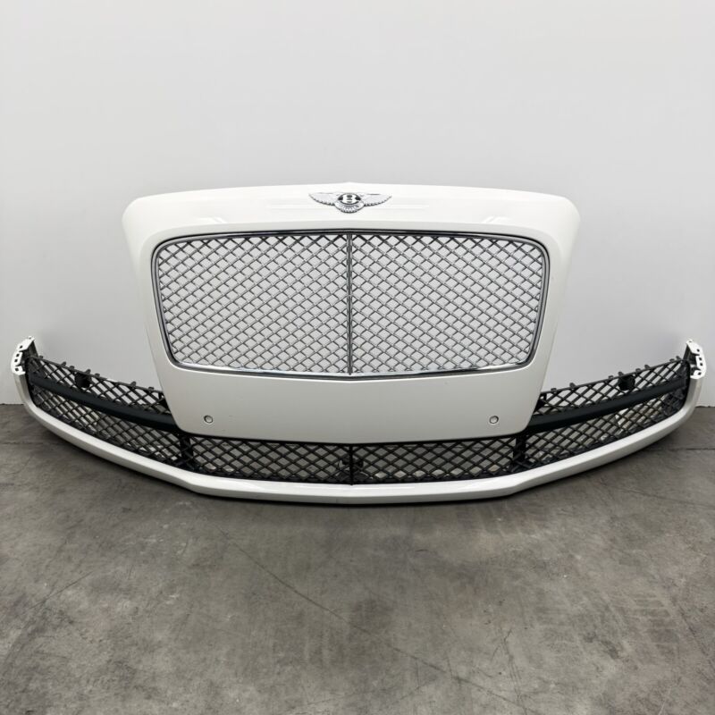 4W0.807.221 / 4W0 807 221 / 4W0807221 13-18 BENTLEY FLYING SPUR FRONT BUMPER COVER COMPLETE WITH GRILLS & SENSORS OEM