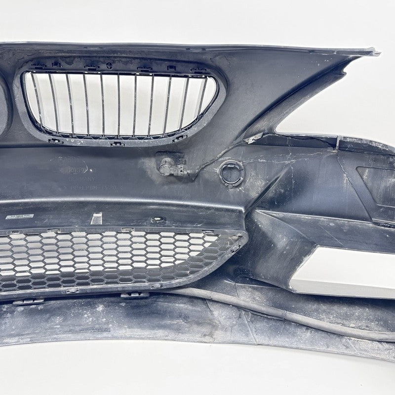 5111 7 899 508 / 51117899508 06-10 BMW M6 E63 E64 FRONT BUMPER COVER COMPLETE WITH GRILLS AND SENSORS OEM