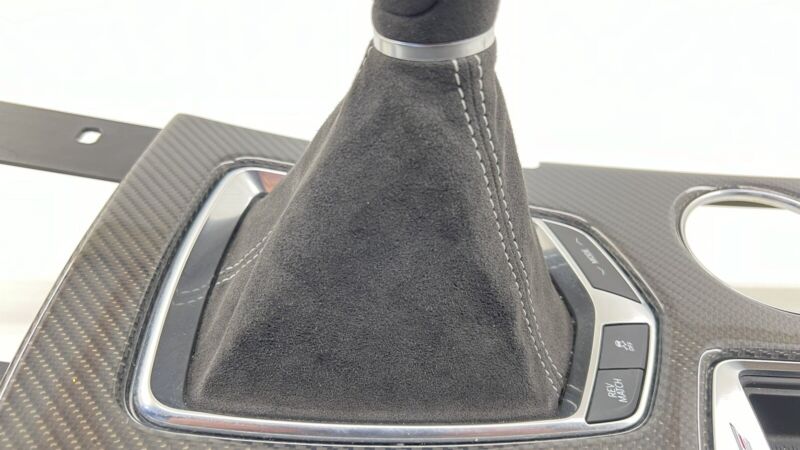 87828564 22-24 CADILLAC CT5 V BLACKWING MANUAL SHIFT BOOT SURROUND PANEL CARBON FIBER OEM