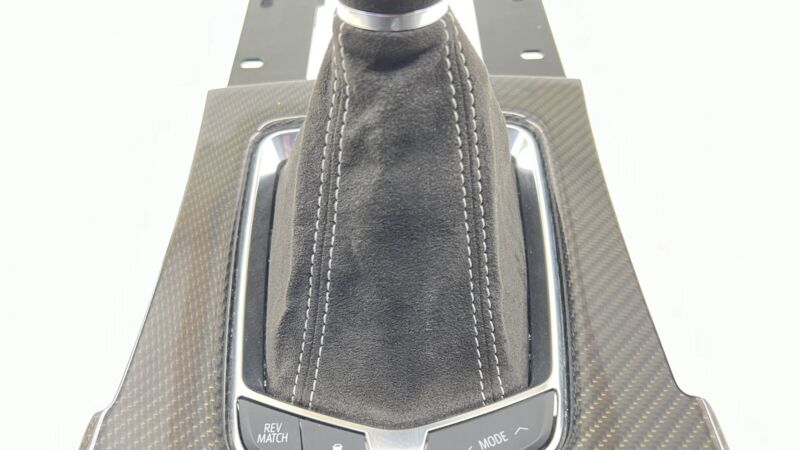 87828564 22-24 CADILLAC CT5 V BLACKWING MANUAL SHIFT BOOT SURROUND PANEL CARBON FIBER OEM