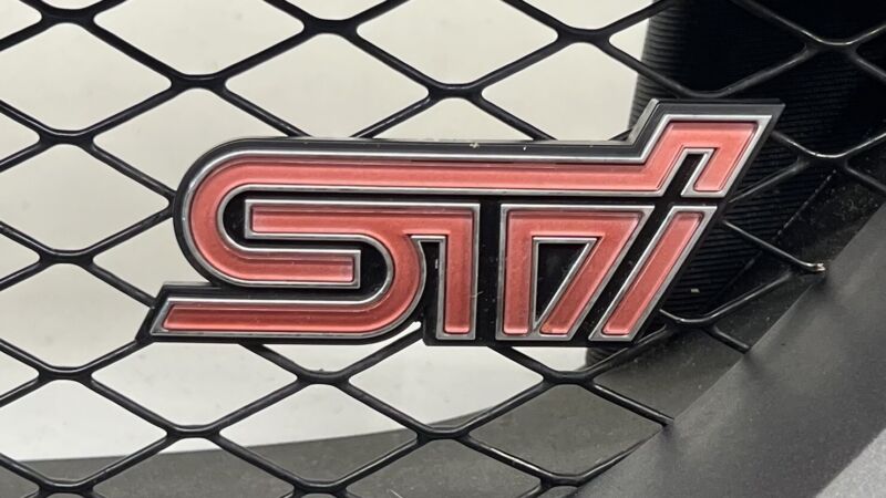 08-14 SUBARU WRX STI FRONT BUMPER UPPER GRILLE TRIM W/ EMBLEM OEM