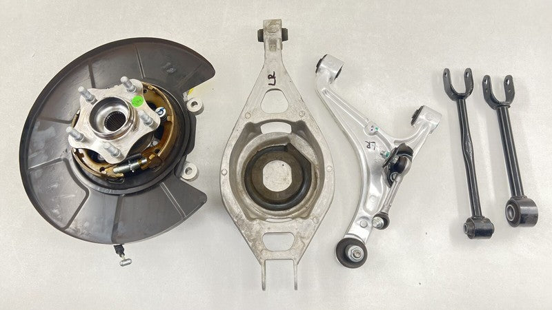 24-25 NISSAN Z NISMO LEFT REAR SPINDLE KNUCKLE HUB BEARING W/ CONTROL ARMS OEM