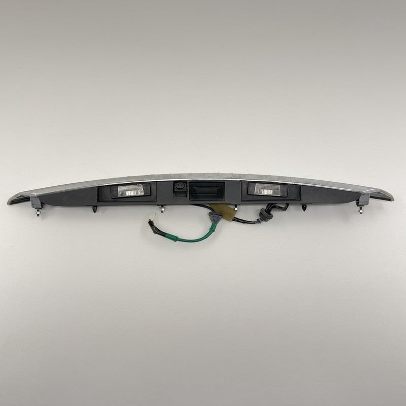 84810-4HB0A / 84810 4HB0A / 848104HB0A 14-17 Infiniti Q50 Chrome License Plate Light Trunk Trim Moulding W/ Camera OEM