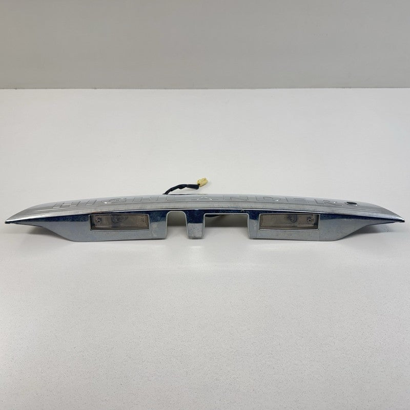 76801-48330/ 76801 48330 / 7680148330 08-13 Toyota Highlander Rear Trunk License Plate Light Trim Moulding Chrome OEM