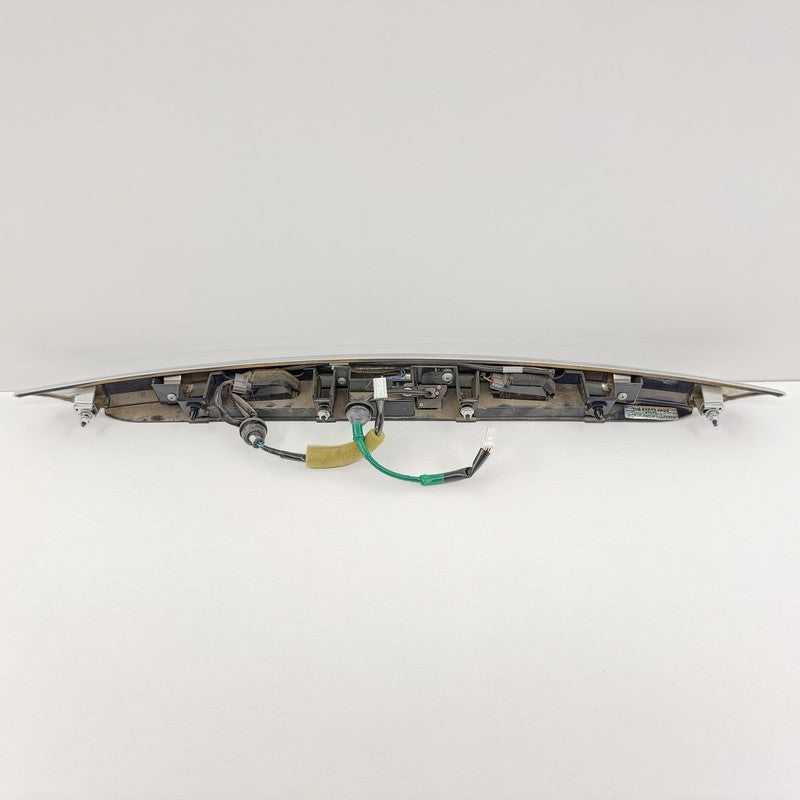 84810-4HB0A / 84810 4HB0A / 848104HB0A 14-17 Infiniti Q50 Chrome License Plate Light Trunk Trim Moulding W/ Camera OEM