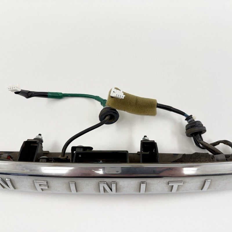 84810-4HB0A / 84810 4HB0A / 848104HB0A 14-17 Infiniti Q50 Chrome License Plate Light Trunk Trim Moulding W/ Camera OEM