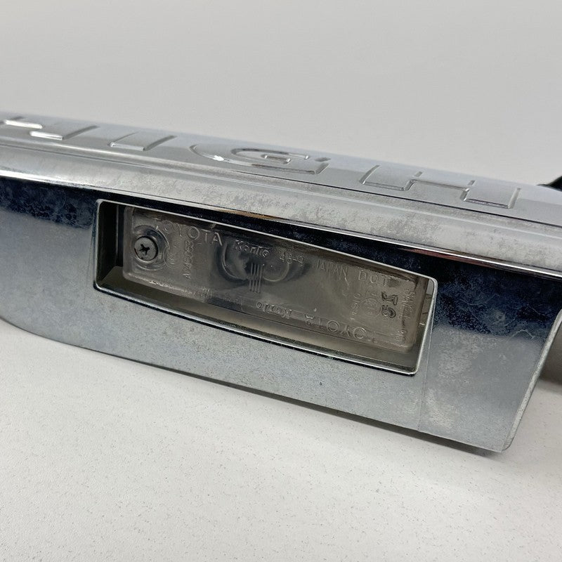76801-48330/ 76801 48330 / 7680148330 08-13 Toyota Highlander Rear Trunk License Plate Light Trim Moulding Chrome OEM