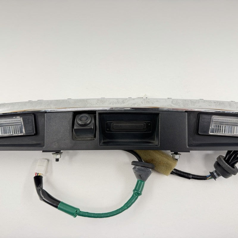 84810-4HB0A / 84810 4HB0A / 848104HB0A 14-17 Infiniti Q50 Chrome License Plate Light Trunk Trim Moulding W/ Camera OEM