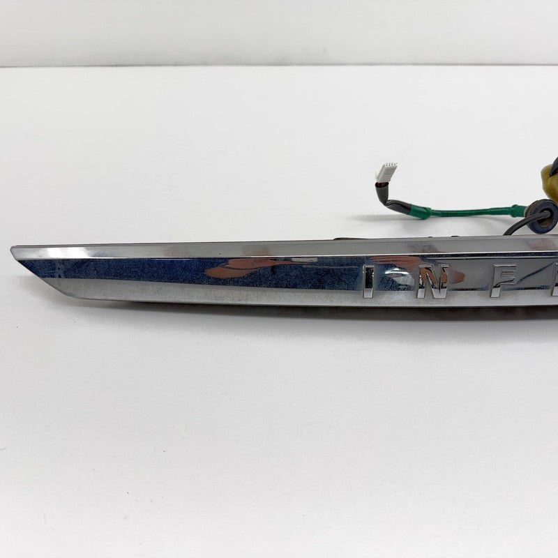 84810-4HB0A / 84810 4HB0A / 848104HB0A 14-17 Infiniti Q50 Chrome License Plate Light Trunk Trim Moulding W/ Camera OEM