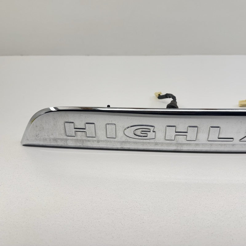 76801-48330/ 76801 48330 / 7680148330 08-13 Toyota Highlander Rear Trunk License Plate Light Trim Moulding Chrome OEM
