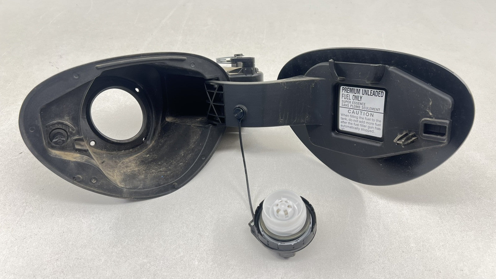 5147B1-E00 / 5147B1 E00 / 5147B1E00 22-25 TOYOTA GR86 FUEL TANK GAS CAP DOOR LID COVER BLACK 5147B1E00 OEM