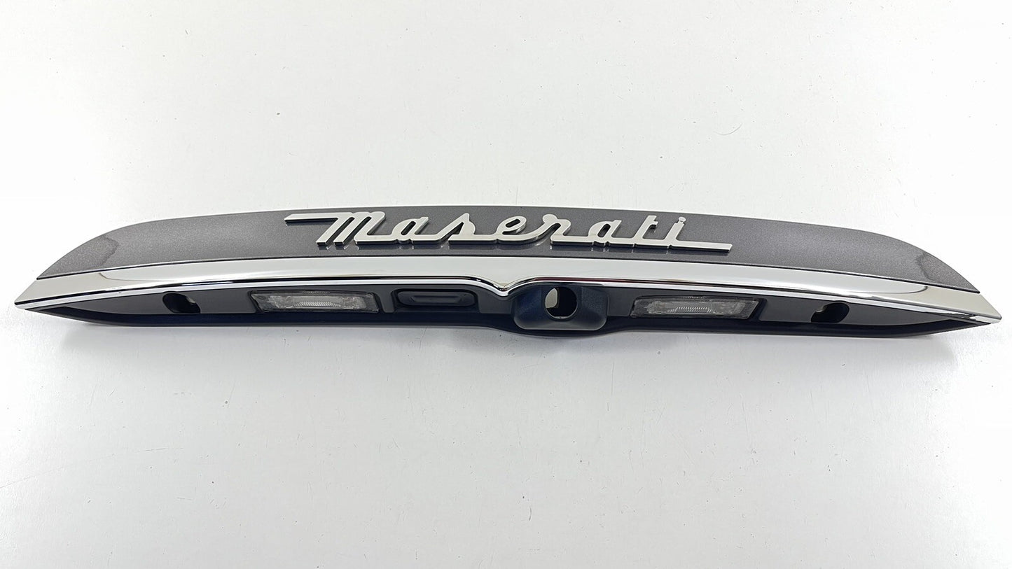 17-23 MASERATI GHIBLI LICENSE PLATE LIGHT TRUNK TRIM GARNISH MOULDING BEZEL OEM