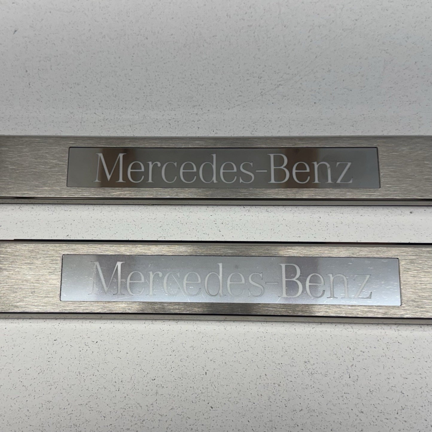 12-18 Mercedes W218 CLS550 Front Illuminated Door Sill Scuff Kick Plate Pair OEM