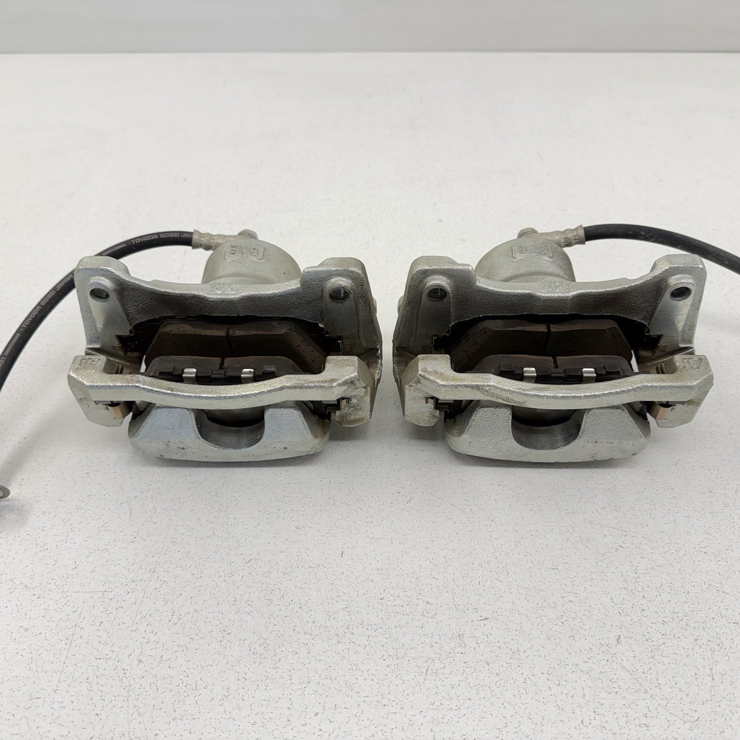 23-26 Toyota Prius FWD Front Advics Brake Caliper Pair Left & Right OEM