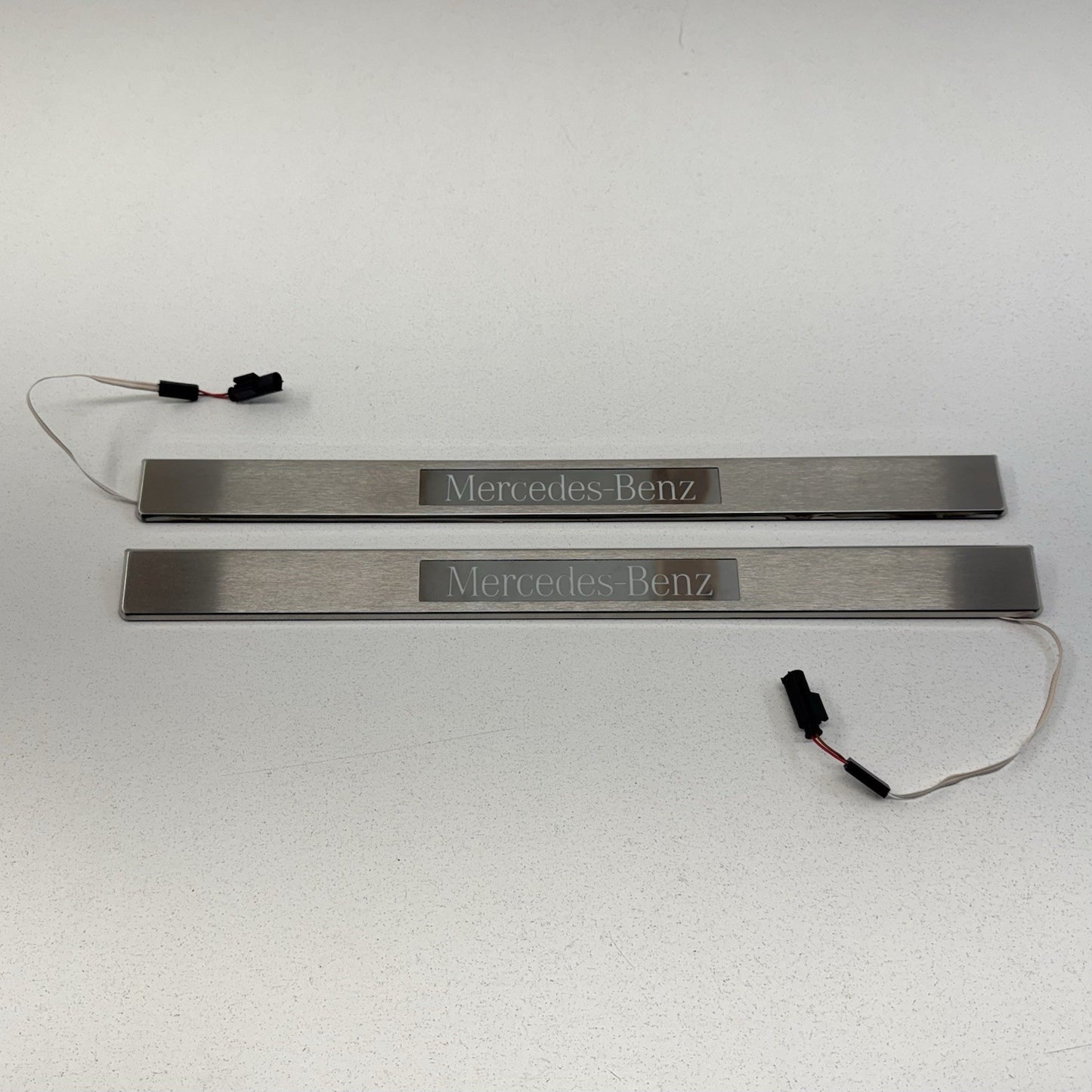 12-18 Mercedes W218 CLS550 Front Illuminated Door Sill Scuff Kick Plate Pair OEM
