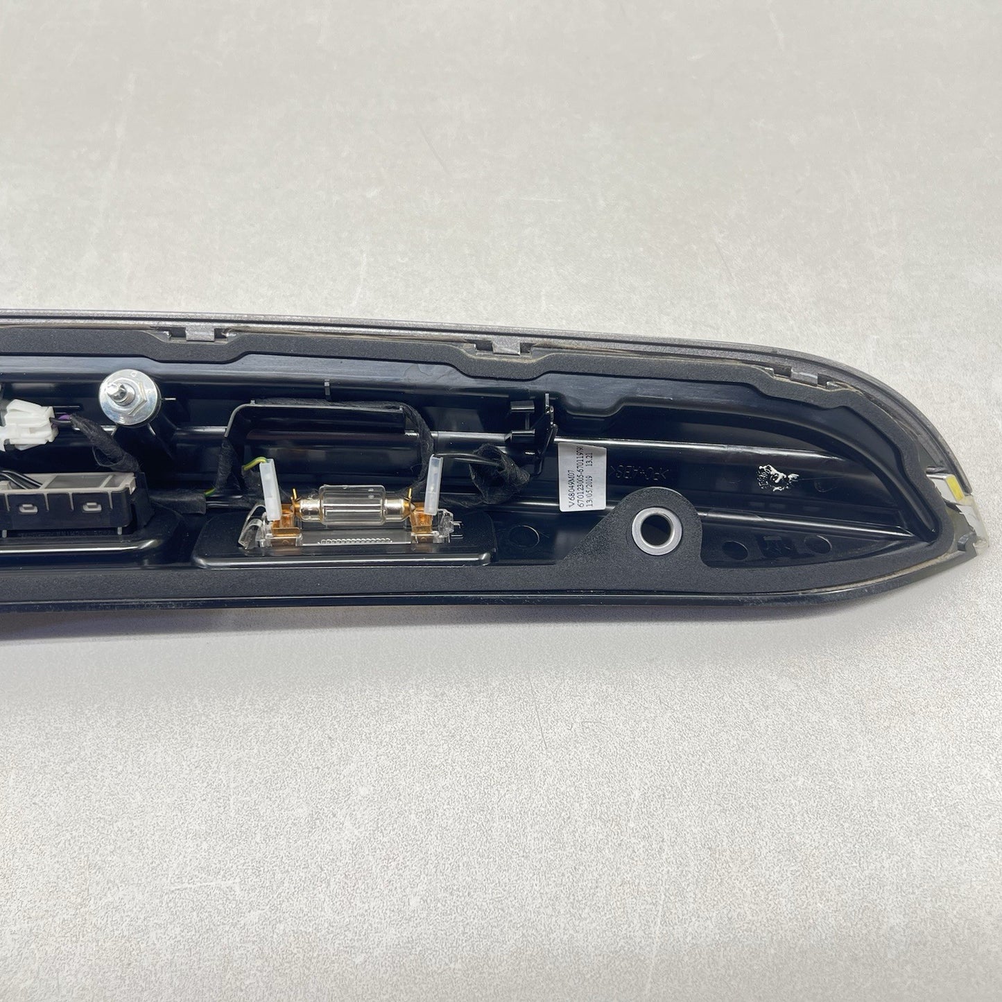 17-24 MASERATI GHIBLI TRUNK GARNISH TRIM LICENSE PLATE LIGHT MOULDING BEZEL OEM