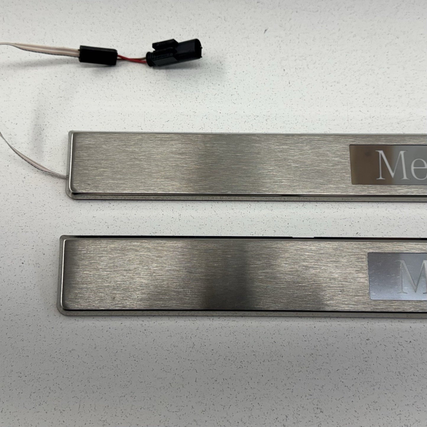 12-18 Mercedes W218 CLS550 Front Illuminated Door Sill Scuff Kick Plate Pair OEM
