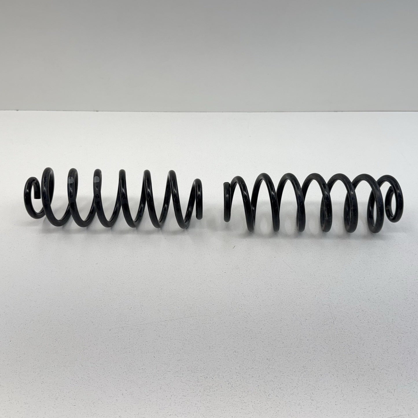 25-26 Toyota Camry FWD Rear Suspension Coil Spring Pair OEM
