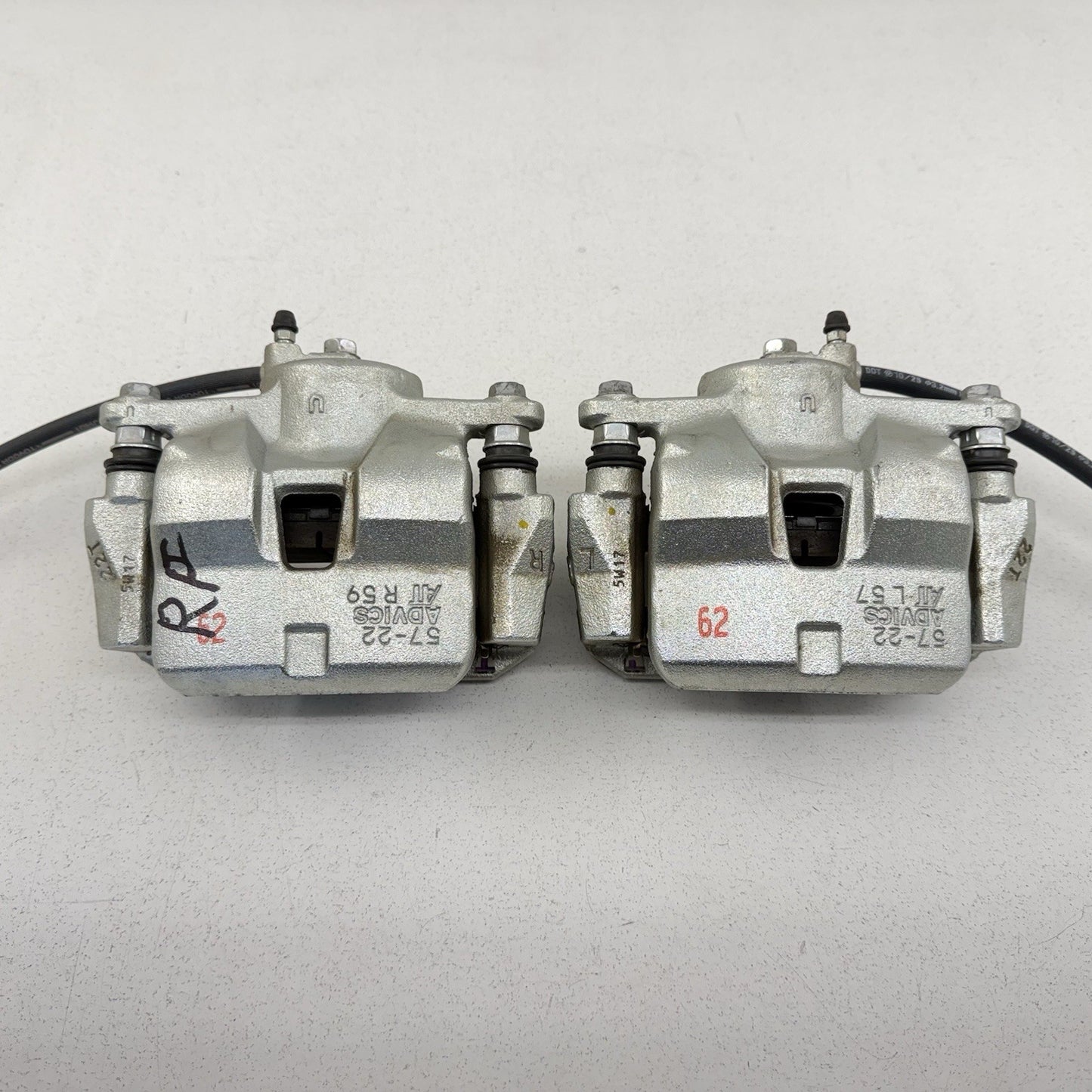 23-26 Toyota Prius FWD Front Advics Brake Caliper Pair Left & Right OEM