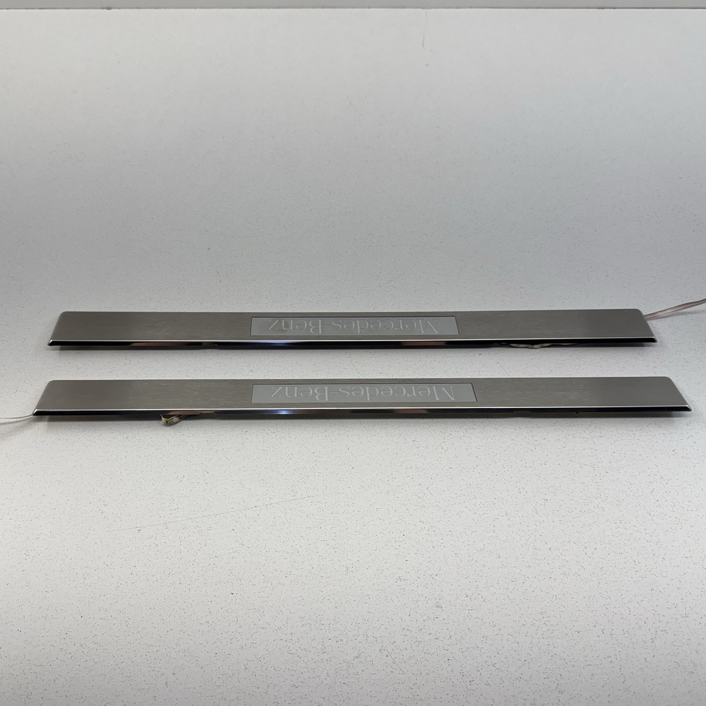 12-18 Mercedes W218 CLS550 Front Illuminated Door Sill Scuff Kick Plate Pair OEM