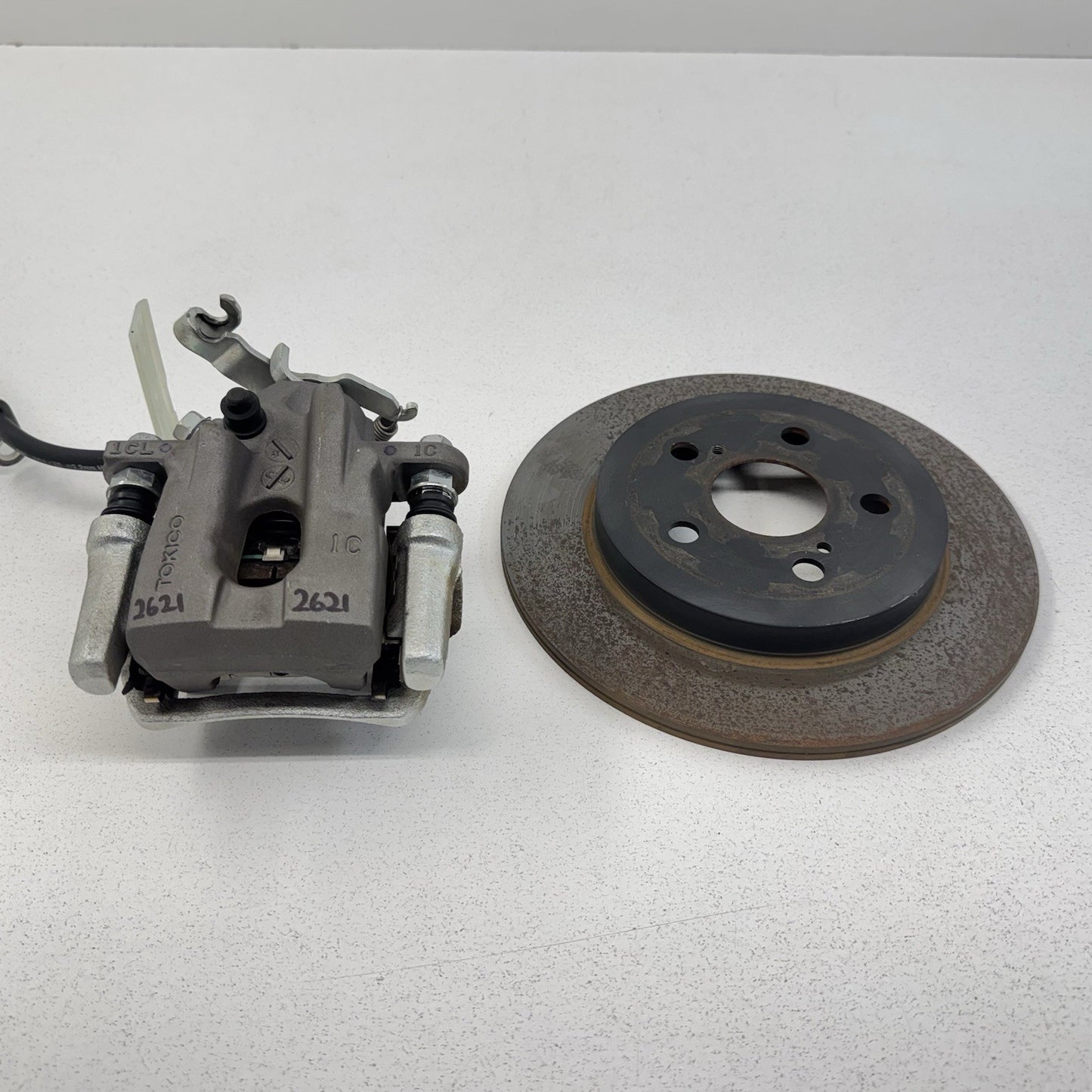 17-22 Toyota Prius / Prius Prime Driver Left Rear Brake Caliper W/ Rotor OEM