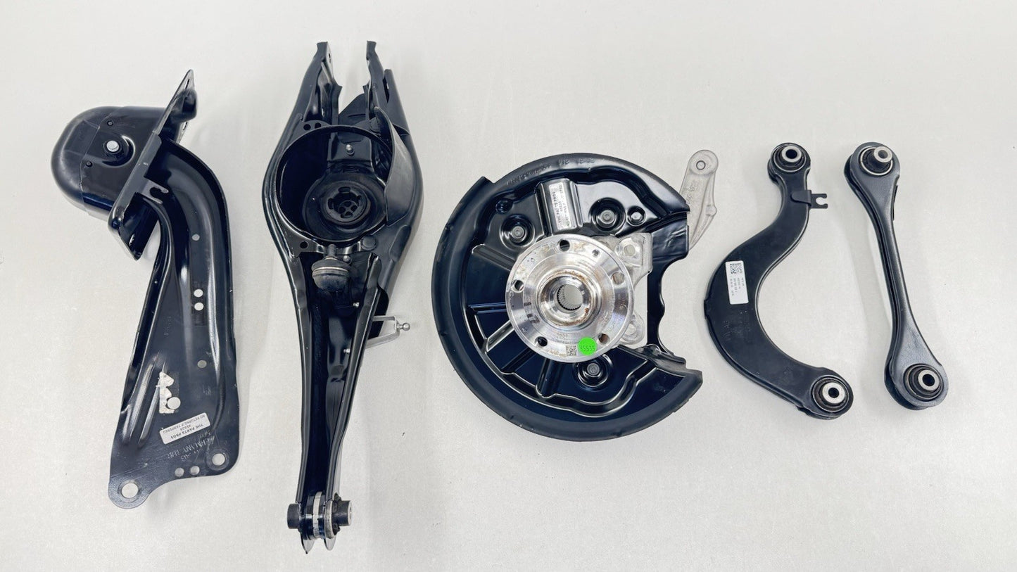 22-26 Volkswagen Golf R Left Rear Knuckle Hub W/ Control Arm Suspension Set OEM