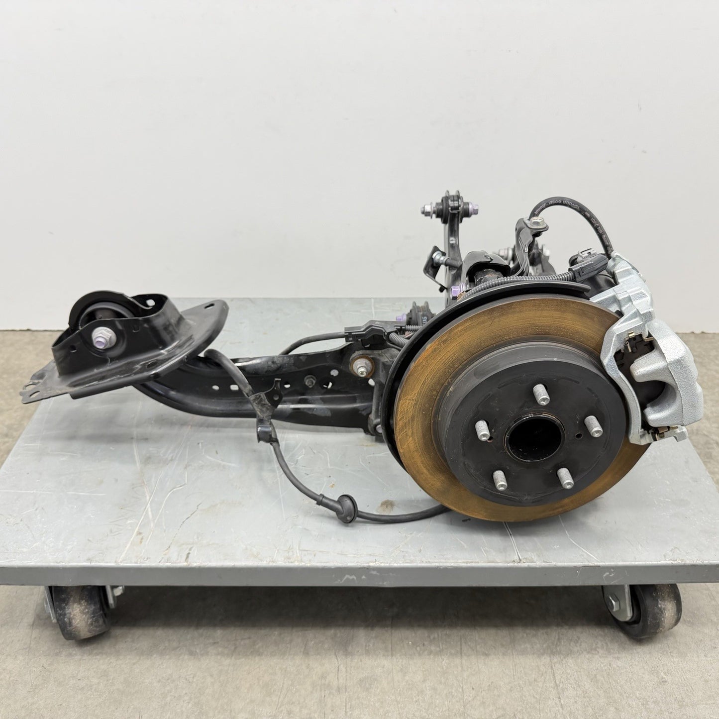 23-26 Toyota Prius Driver Left Rear Suspension Knee Assembly Set OEM