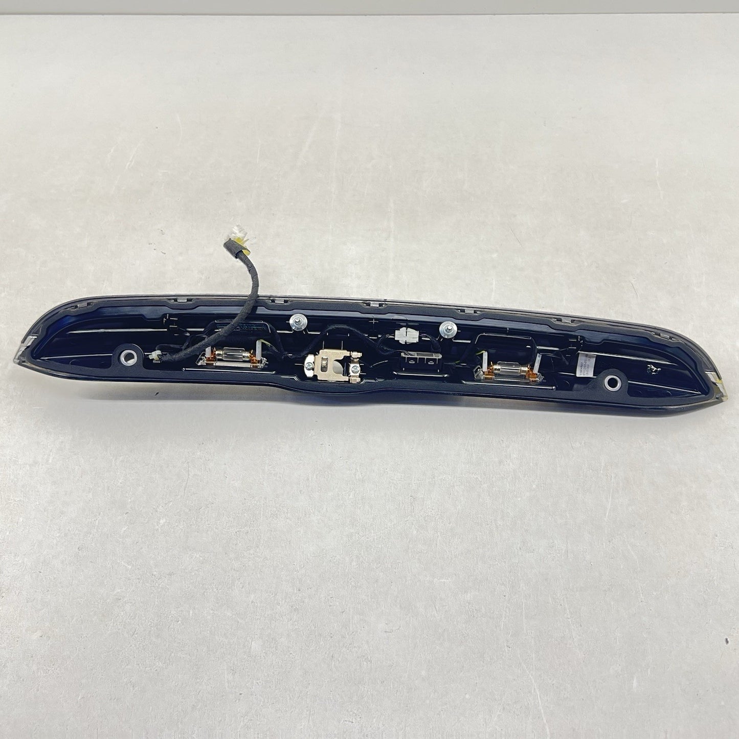 17-24 MASERATI GHIBLI TRUNK GARNISH TRIM LICENSE PLATE LIGHT MOULDING BEZEL OEM